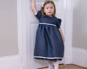 Baby girl cerimonial dress in navy blue with puffed sleeves