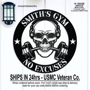 May include: Black metal sign with the text "SMITH'S GYM NO EXCUSES" featuring a skull with headphones and a barbell in its mouth. The sign is made of 14-gauge American-made steel. The sign also includes the text "crossmetalworks".