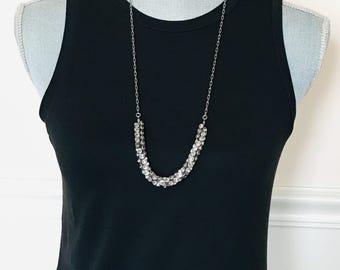 J. Crew Necklace featuring tubular crystal design in silvertone and rhinestones.
