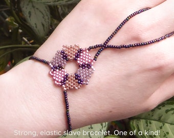 Beadwork flower with different metallic delica beads. Elastic slave bracelet. Gold plated metallic delica beads. Ring bracelet.