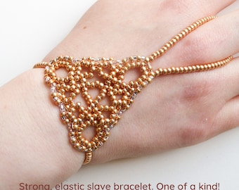 Gold metallic beadwork lace. Elastic slave bracelet. Beaded finger jewelry. Hand jewelry. Ring bracelet. Hand bracelet. Hand chain.