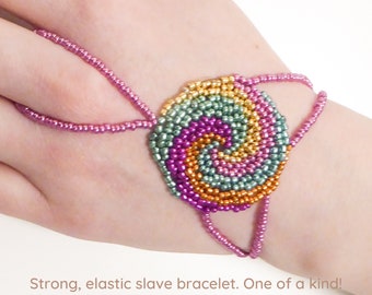 Spiral beadwork. Elastic slave bracelet. Different metallic irregular seed beads. Beaded hand finger jewelry. Hand jewelry. Ring bracelet.