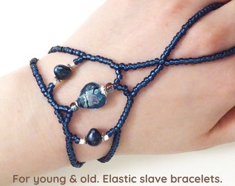 Blue Heart of foiled glass with a flower within. Elastic slave bracelet. Bracelets ring. Finger bracelet. Hand jewelry Ring bracelet