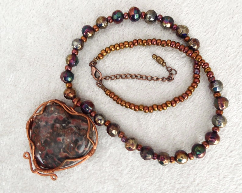 Natural big Leopard Skin Jasper heart, pendant necklace. Copper wire. Soft faceted rainbow metallic glass beads. Copper colored seed beads. image 3