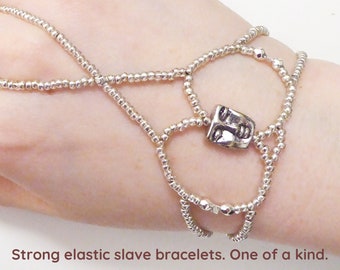 Silver plated face and faceted beads. Elastic slave bracelet. Hand finger jewelry. Bracelet ring. Finger bracelet. Hand chain.