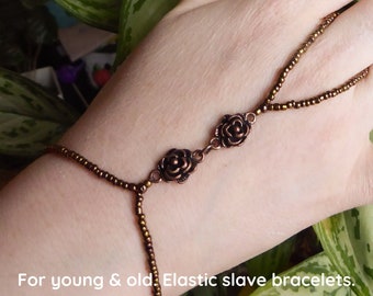 Nickel free copper metal flower spacer bars. Elastic slave bracelet. Finger bracelet. Hand jewelry. Ring bracelet. Hand bracelet. Hand chain