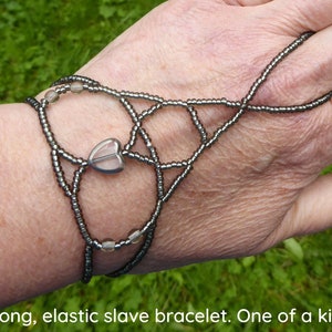 Silver window heart bead. Elastic slave bracelet. Beaded stretchy bracelets ring. Finger bracelet. Hand jewelry. Hand chain. Ring bracelet. image 1