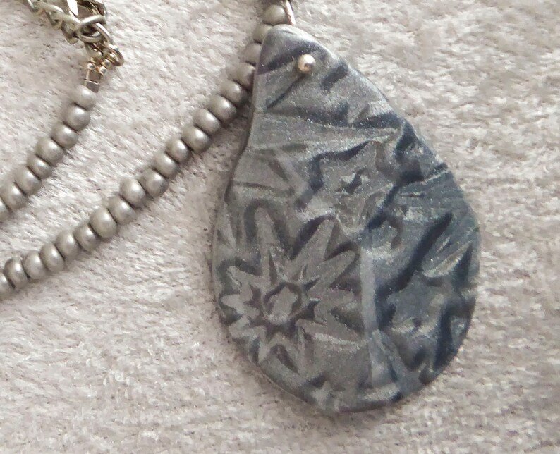 Sparkling silver polymer clay with 3D effect. A dome of shiny resin. Silver colored clasp and chain. Free form beaded pendant necklace. image 5