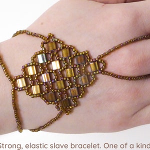 Gold iris rainbow Tila beads. Elastic slave bracelet. Gold luster dark topaz rainbow seed beads. Beaded Finger bracelet. Hand jewelry. image 1