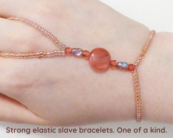 Man-made Cherry Volcano Quartz glass beads. Pink elastic slave bracelet. Hand bracelet. Finger bracelet. Hand jewelry. Ring bracelet.