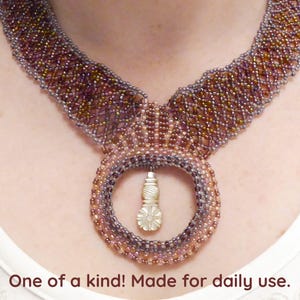 Sale 50% Mother of pearl flower. Beadwork with various pink seed beads. Nickel free copper clasp. Lace bib necklace Freeform beaded necklace