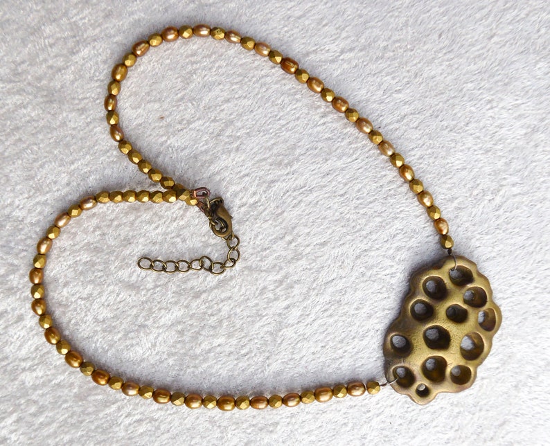 Gold polymer clay in a 3D net. Beautiful gold colored freshwater pearls. Faceted gold colored glass beads. Bronze colored clasp and chain. image 5