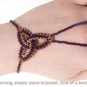 Purple gold metallic Celtic knot beadwork. Elastic slave bracelet. Bright copper plated delica beads. Beaded finger bracelet. Ring bracelet. image 1