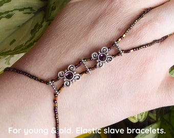 Purple crystals, silver plated Swarovski spacer bars. Purple metallic elastic slave bracelet. Hand jewellery. Finger bracelet. Ring bracelet