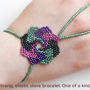 Beadwork flower with different metallic seed beads. Elastic slave bracelet. Gold plated metallic delica beads. Ring bracelet. image 1