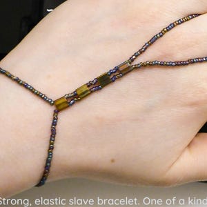 Gold metallic Tila spacers. Elastic slave bracelet. Beaded Bracelet ring. Hand jewellery. Finger bracelet. Ring bracelet. Hand chain ring.