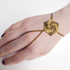 Hexagonal spiral beadwork. Elastic slave bracelet. Gold iris metallic delica beads. Beaded hand finger jewelry. Hand jewelry. Ring bracelet. image 3