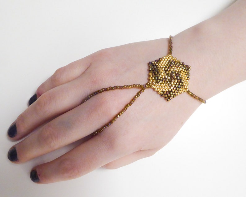 Hexagonal spiral beadwork. Elastic slave bracelet. Gold iris metallic delica beads. Beaded hand finger jewelry. Hand jewelry. Ring bracelet. image 3