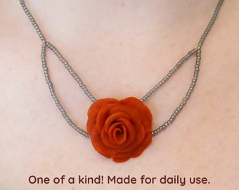 3D Rose pendant necklace. Polymer clay necklace. Silver plated clasp and chain. Free form beaded seed beads necklace