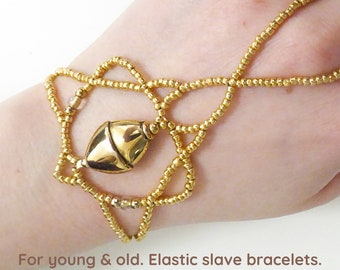 Nickel free gold metal bead. Elastic slave bracelet. Gold metallic Bracelet ring. Hand jewellery. Finger bracelet. Ring bracelet. Hand chain