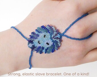 Cute modern style of a LION. Elastic animal slave bracelet. Beadwork with different delica seed beads. Hand chain. Ring bracelet.