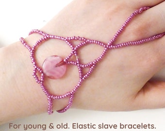 Inside colored pink glass bead. Pink metallic elastic slave bracelet. Beaded Hand finger jewelry. Finger bracelet. Ring bracelet.