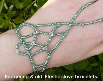 Rhinestone elastic green metallic slave bracelet. Beaded finger bracelet. Hand jewelry. Ring bracelet. Hand bracelet. Hand chain ring.