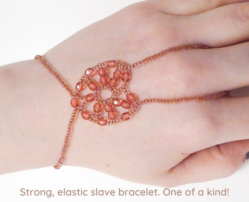 Orange pink faceted heart. Elastic slave bracelet. Terracotta lined crystal luster seed bead. Ring bracelet. Hand jewelry. Finger jewelry. image 1