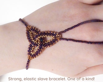 Purple gold metallic Celtic knot beadwork. Elastic slave bracelet. Bright copper plated delica beads. Beaded finger bracelet. Ring bracelet.