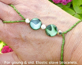 Green mother of pearl. Silver plated beads. Elastic slave bracelet. Beaded Bracelet ring. Hand jewellery. Finger bracelet. Ring bracelet.