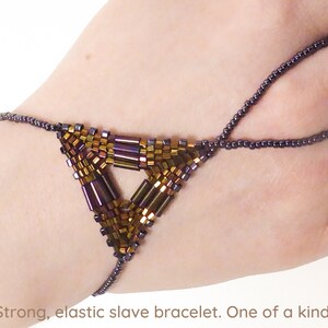 Gold iris & purple metallic elastic slave bracelet. Beaded hand finger jewelry. Beadwork finger bracelet. Hand jewelry. Ring bracelet. image 1