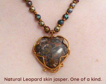 Natural big Leopard Skin Jasper heart, pendant necklace. Copper wire. Soft faceted rainbow metallic glass beads. Copper colored seed beads.