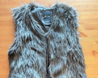 gray fuzzy vest