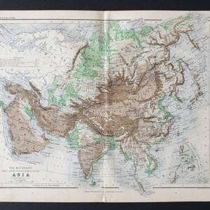 May include: Antique topographical map of Asia, featuring detailed land elevations in shades of brown and green. The map includes labels for mountains, table lands, plains, and valleys. The title "ASIA" is prominently displayed, with additional text indicating the map's origin.