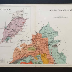 Op de afbeelding: Een vintage kaart van het Isle of Man en North Cumberland, met gedetailleerde geografische informatie. De kaart is verdeeld in secties met verschillende kleuren, waaronder roze, groen en oranje, en bevat tekstlabels en lijnen.