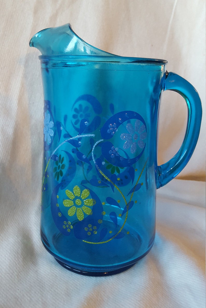 Vintage Blue Glass Ice Tea Pitcher With Raised Daisies And Image 0