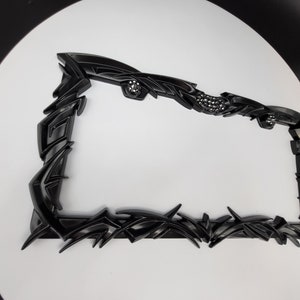 MAXIMUM IMPACT Black Tribal Rocker Punk Hardcore Car Truck Metal License Plate Frame with Eye Catching Crystal Rhinestones in 31 Colors WOW