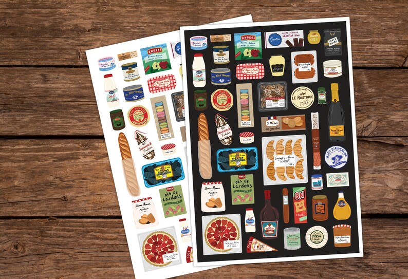 May include: Two sheets of stickers featuring illustrations of French food items. The stickers are on white and black backgrounds. The stickers include images of bread, cheese, wine, pastries, and other French foods.