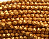 25 6mm Matte Metallic Antique Gold Czech glass beads, firepolished, faceted round beads, C7425