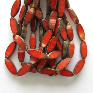 Twelve Czech glass spindle beads - 16 x 6mm - opaque marbled red & white picasso - table cut  - almond shaped beads C00641