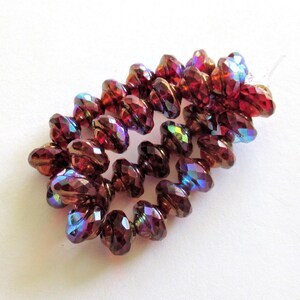 15 Czech glass mini faceted saturn or saucer beads - transparent red & orange w/ bronze and ab accents - 6 x 8mm - C00572