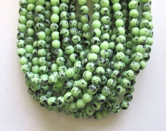 Lot of 50 4mm Czech glass druk beads - opaque speckled green smooth round druks - C0008