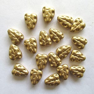 Twenty Czech glass leaf beads - 12 x 9mm matte metallic gold textured center drilled leaves - C00801
