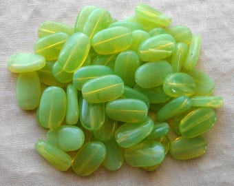 15 Light Mint Green Opal slightly twisted oval Czech Glass beads, 14mm x 8mm pressed glass beads C00021