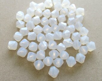Lot of 24 6mm Czech glass Preciosa Crystal bicone beads -  translucent milky white faceted glass bicones C00761