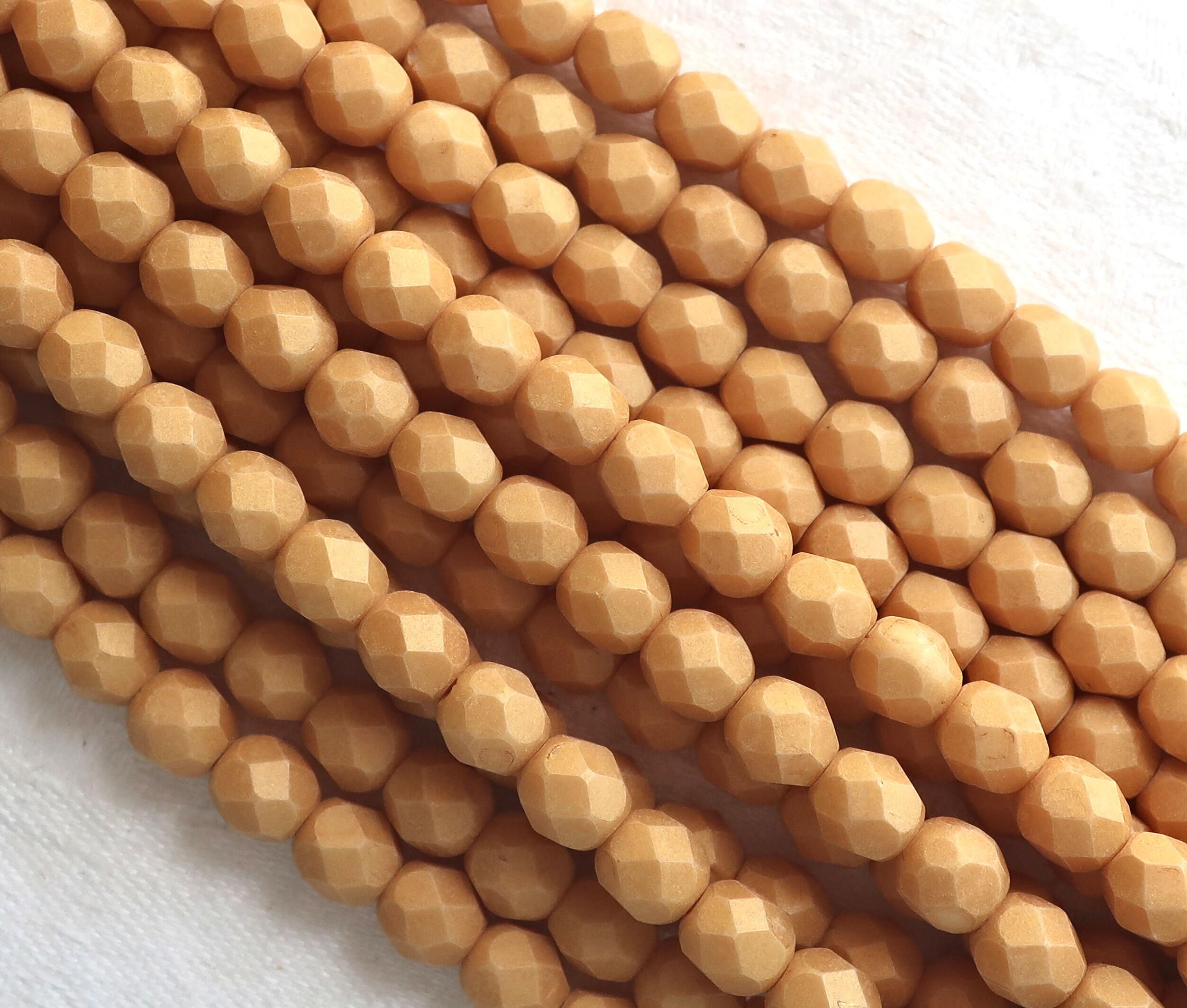 Lot of 25 6mm Czech glass beads - faceted, fire polished neutral opaque beige, yellow / gold Pacifica Ginger beads C8601