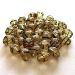 Lot of fifteen oval 10 x 9mm Czech glass snail beads - tortoise - tortoiseshell and gold carved glass snail beads - C00111