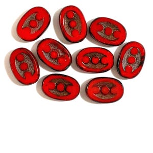 Ten 14 x 10mm rustic oval opaque red picasso, table cut, Czech glass beads with dots front and back C0001