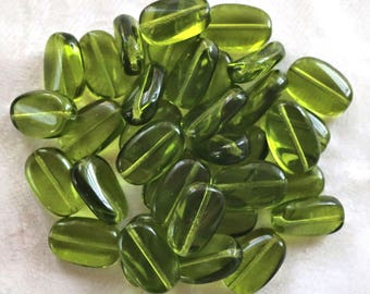 Lot of 15 transparent Olivine, Olive Green slightly twisted oval Czech Glass beads, 14mm x 8mm pressed glass beads C00411