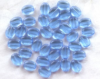 25 transparent light sapphire blue flat oval Czech Glass  beads, 12mm x 9mm pressed glass beads C6425